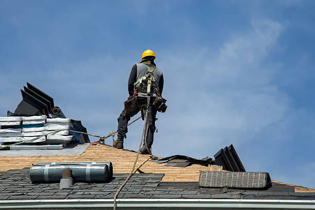 Professional Roof Replacement technician working in Battle Ground, IN